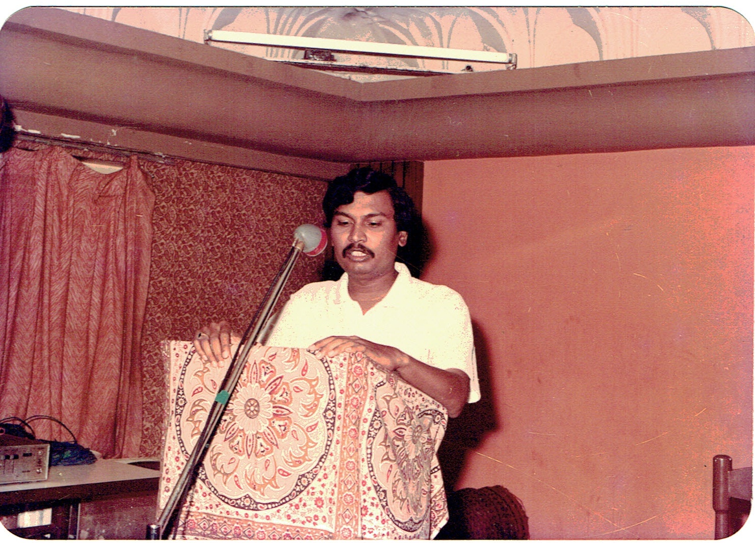 Addressing a gathering — early years.