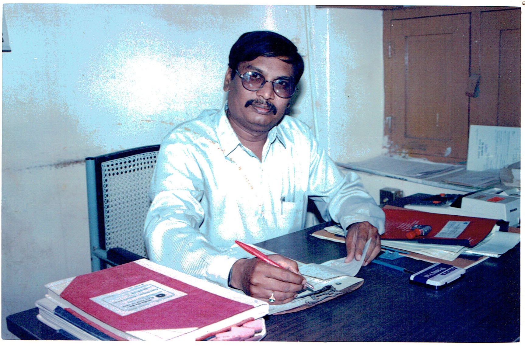 At the desk — early years in service.