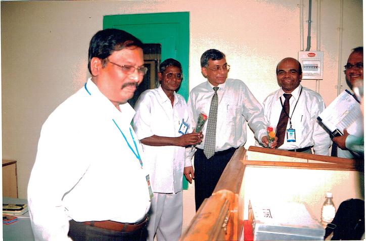 Greeting colleagues at the branch.